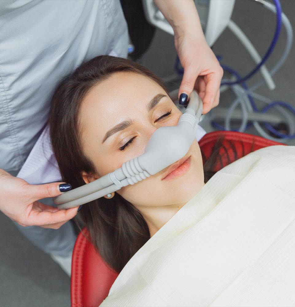 patient undergoing dental sedation for their treatment